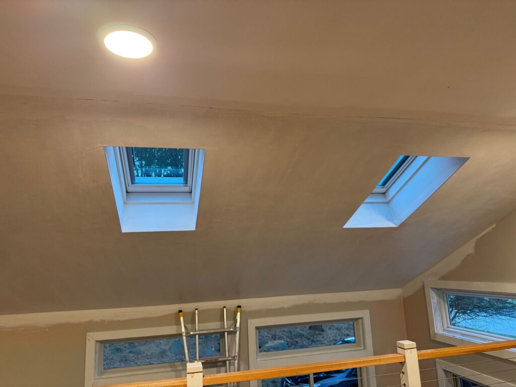Skylight installation in Jamestown, RI with VELUX skylights — Project #12349 by Pinnacle Roofing & Skylights