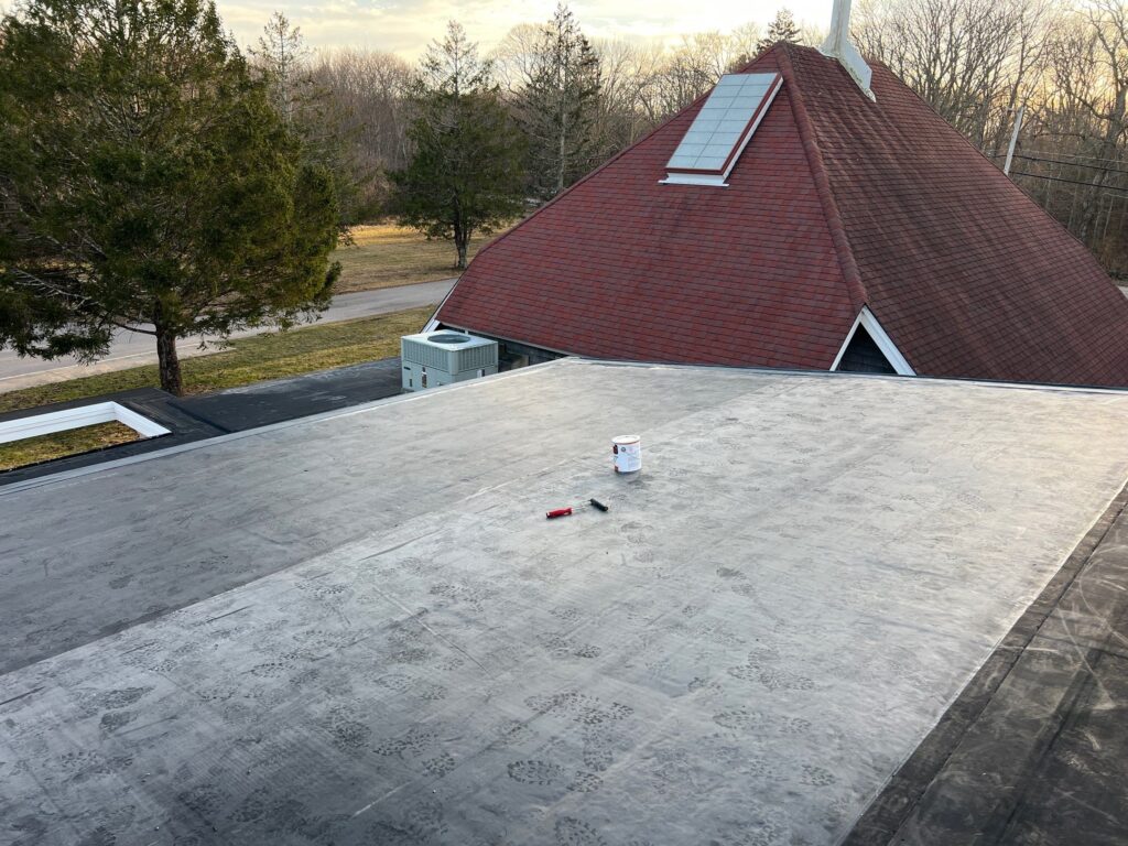 Commercial roofing in Kingston, RI with EPDM rubber membrane — Project #11720 by Pinnacle Roofing & Skylights