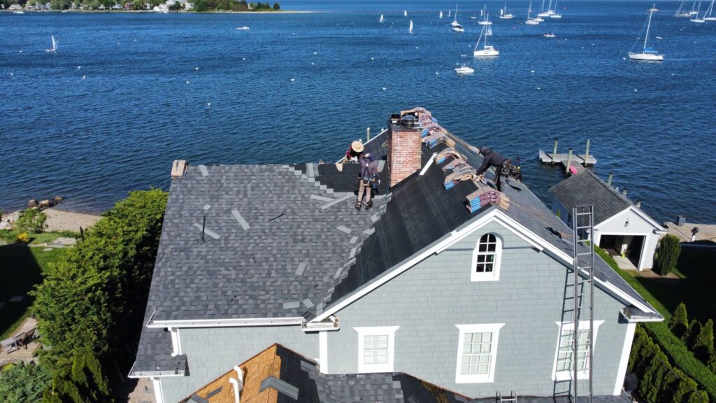 Roof replacement in North Kingstown, RI with asphalt shingles — Project #12295 by Pinnacle Roofing & Skylights