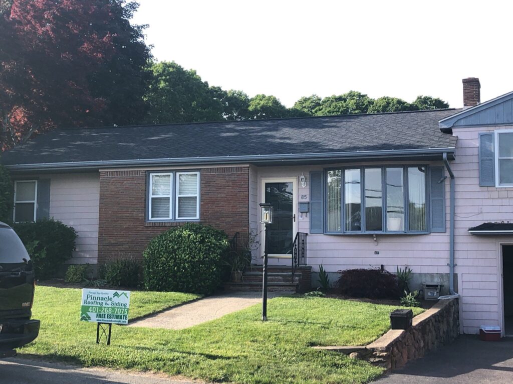Roof replacement in North Providence, RI using CertainTeed Landmark Charcoal Black shingles — Project #11660 by Pinnacle Roofing & Skylights