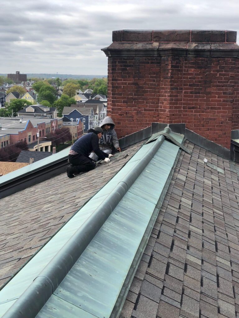 Commercial roofing in Providence, RI with asphalt shingles — Project #11670 by Pinnacle Roofing & Skylights