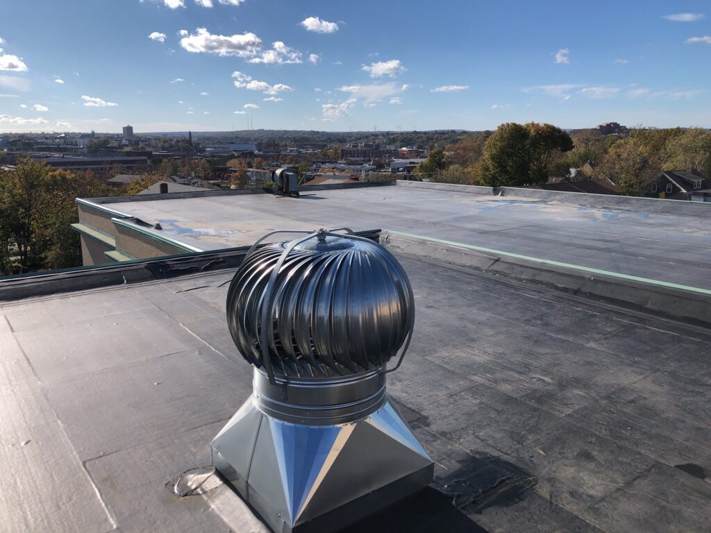 Commercial roofing in Providence, RI with EPDM rubber membrane — Project #12125 by Pinnacle Roofing & Skylights