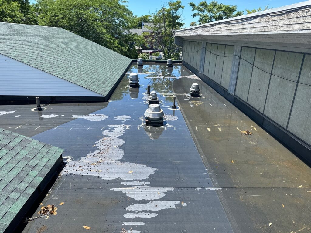 Commercial roofing in Providence, RI with EPDM rubber membrane — Project #12182 by Pinnacle Roofing & Skylights