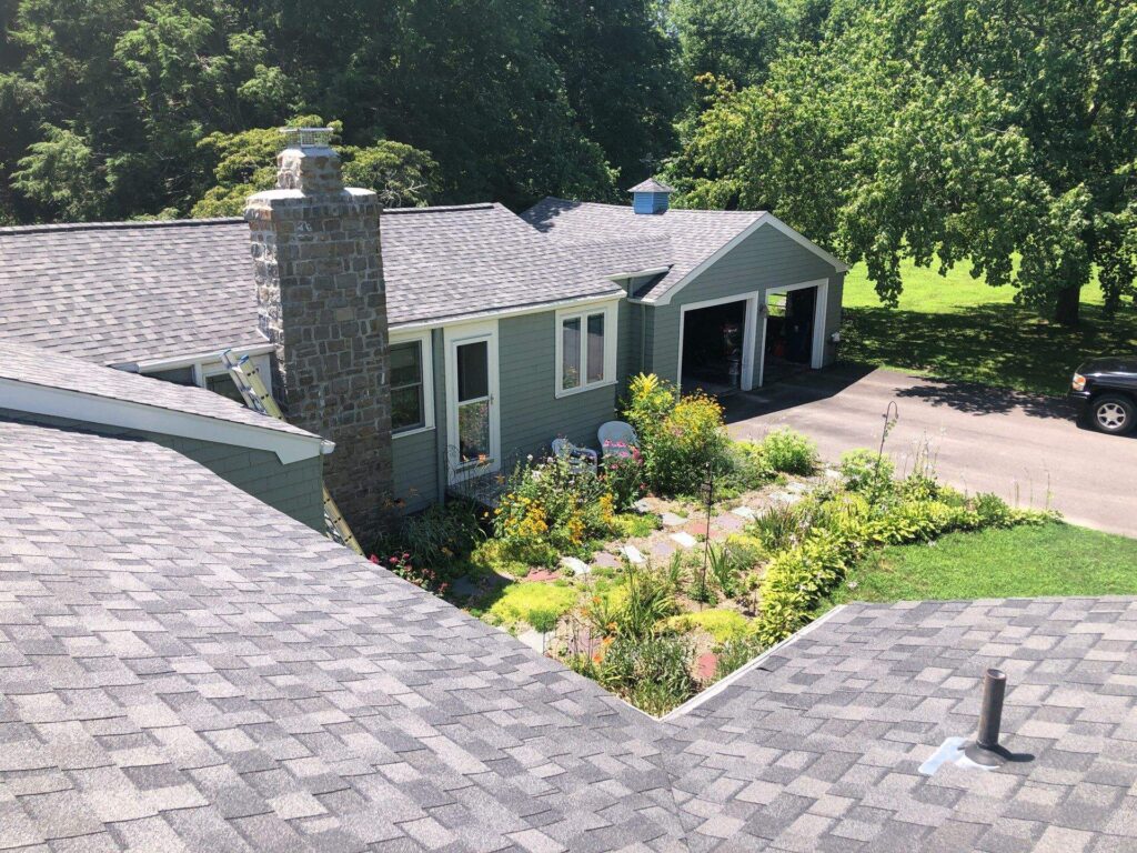Roof replacement in Saunderstown, RI with asphalt shingles — Project #11673 by Pinnacle Roofing & Skylights
