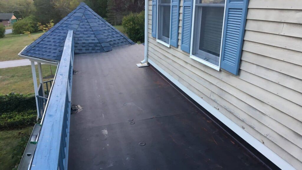 Roof replacement in Saunderstown, RI with EPDM rubber membrane — Project #12046 by Pinnacle Roofing & Skylights