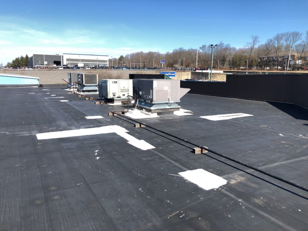 Commercial roofing in West Warwick, RI — Project #11750 by Pinnacle Roofing & Skylights