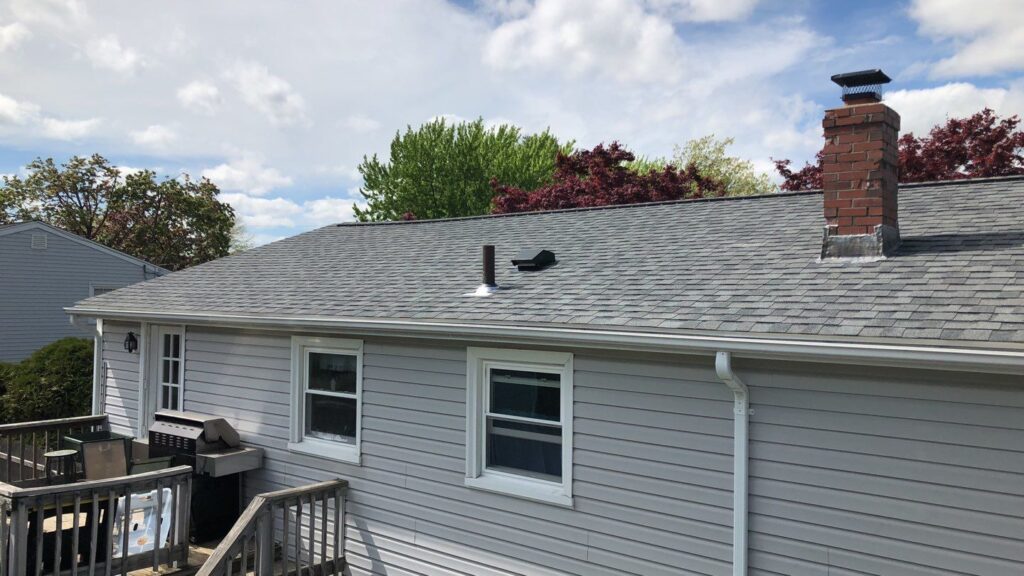 Roof replacement in West Warwick, RI with asphalt shingles — Project #11984 by Pinnacle Roofing & Skylights