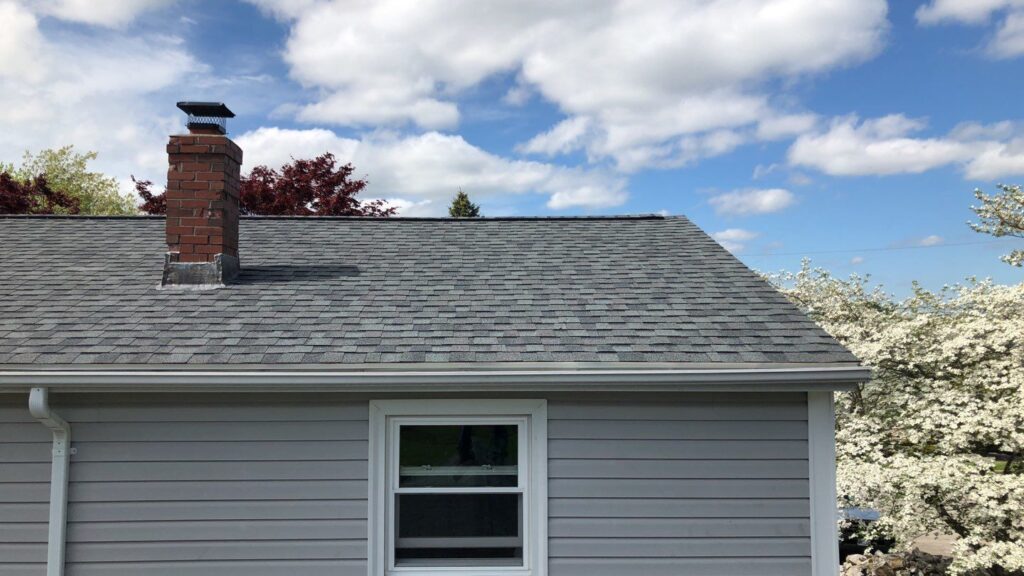 Roof replacement in West Warwick, RI with asphalt shingles — Project #12079 by Pinnacle Roofing & Skylights