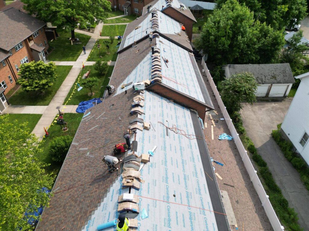 Commercial roofing in Westerly, RI using CertainTeed Landmark PRO — Project #11985 by Pinnacle Roofing & Skylights