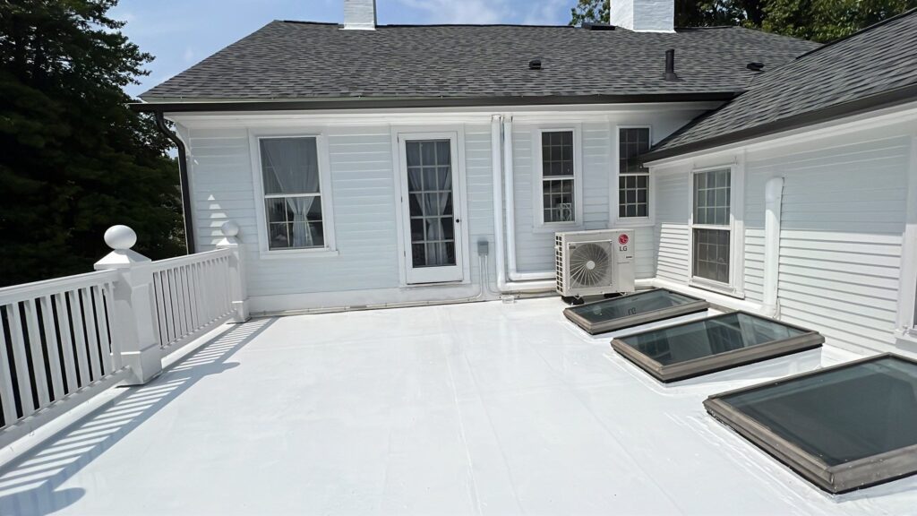 Roof replacement in Wickford, RI with silicone coating — Project #12053 by Pinnacle Roofing & Skylights