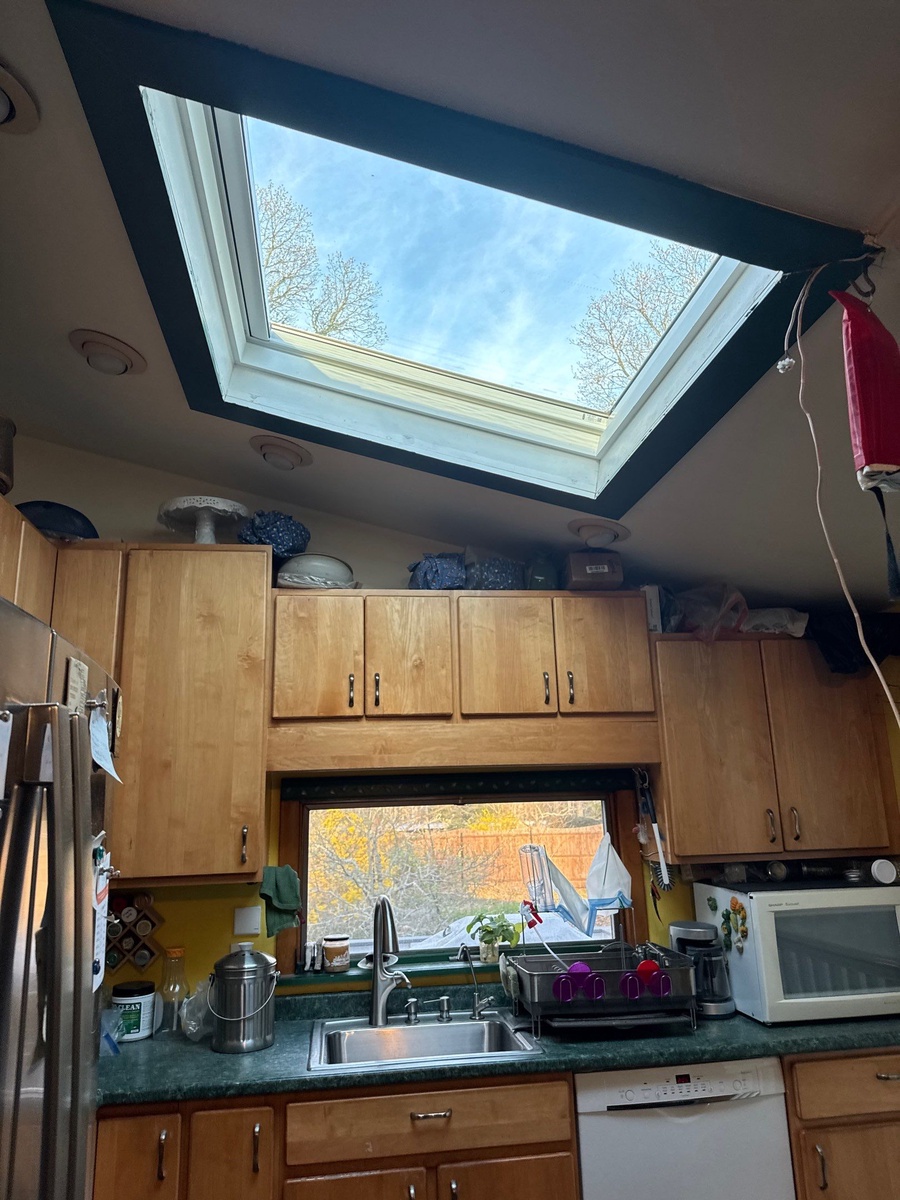 Wide view of VELUX fixed skylight over kitchen in Kingston RI by Pinnacle Roofing