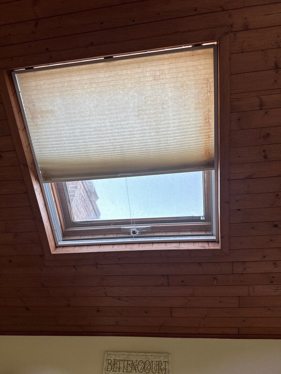 Completed VELUX fixed skylight bringing natural light into entryway Jamestown RI