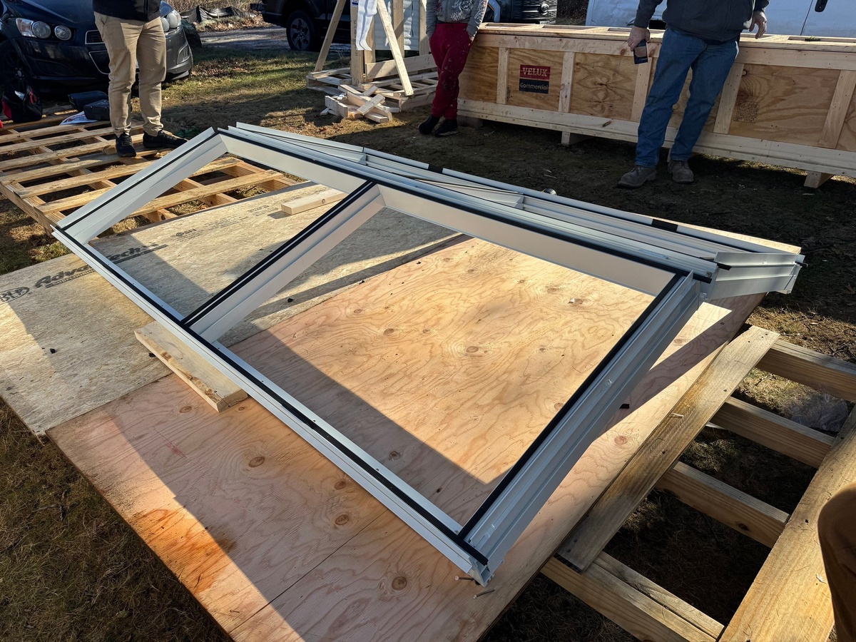 Exterior view of VELUX Ridgeline skylight spanning roof peak in Falmouth Massachusetts